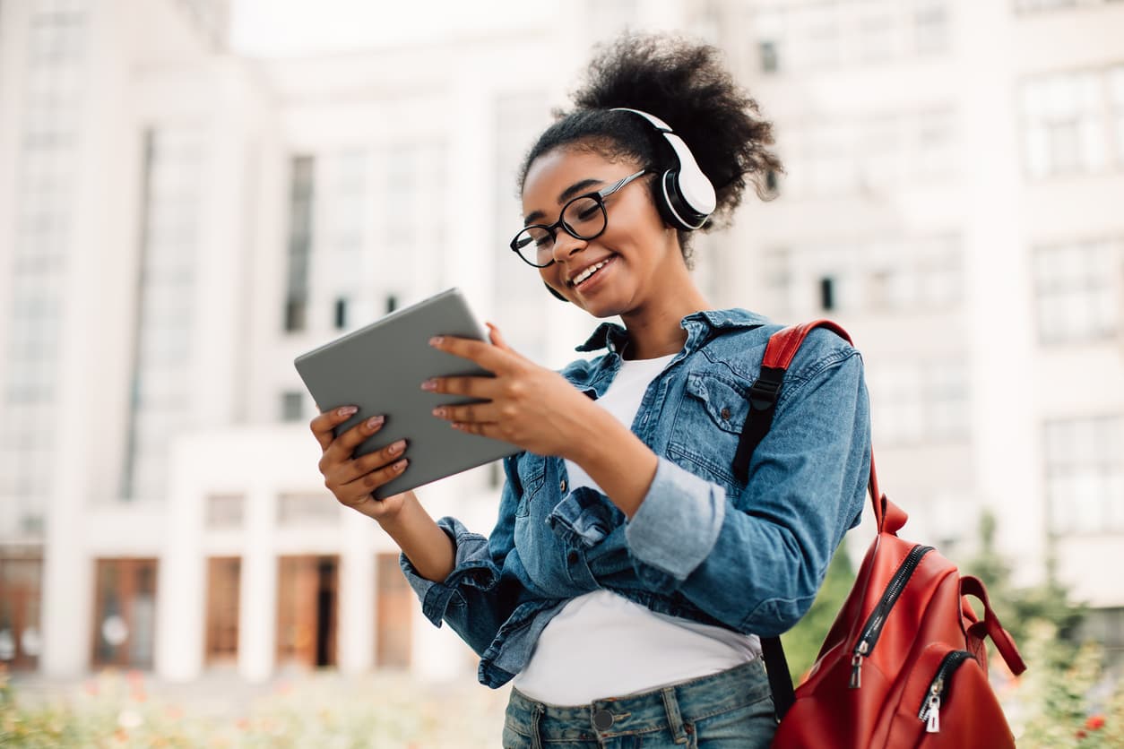 A woman taking an online course